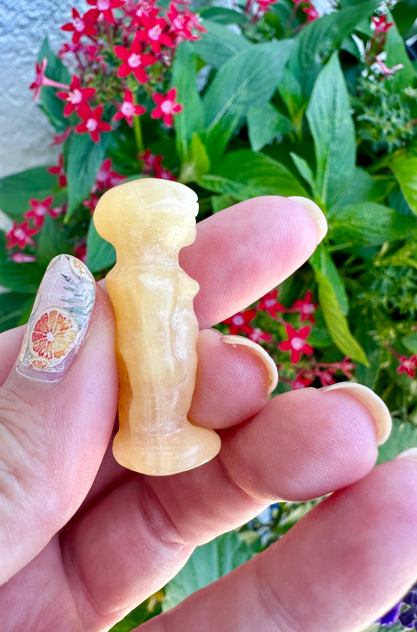 Yellow Calcite Alien Carving: Unique Handcrafted Extraterrestrial Figurine, Ideal for Sci-Fi Fans and Collectors of Novelty Crystal Decor