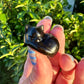 Black Obsidian Sleeping Cat Carving - Protective Gemstone Figurine for Home Decor, Spiritual Guardian, and Negative Energy Shield, Ideal for Cat Lovers