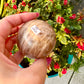 Peach moonstone sphere, 62mm, fertility, balancing, femininy