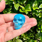 blue howlite skull, skull carving, peace symbol, meditation decor, spiritual artifact, tranquil decor, unique skull art, collector's gem, calming stone, mystic carving, zen accessory, energy focal point, howlite art