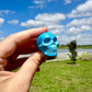 blue howlite skull, skull carving, peace symbol, meditation decor, spiritual artifact, tranquil decor, unique skull art, collector's gem, calming stone, mystic carving, zen accessory, energy focal point, howlite art